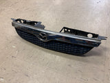 1999-2000 Mazda Protege Front Grill (Broken Tab)