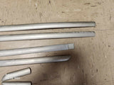 1999-2003 Mazda Protege Door Molding Set (SEDAN)