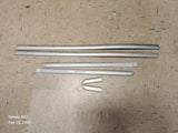 1999-2003 Mazda Protege Door Molding Set (SEDAN)