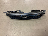 1999-2000 Mazda Protege Front Grill (Broken Tab)