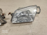 1999-2000 Mazda Protege Headlights Set