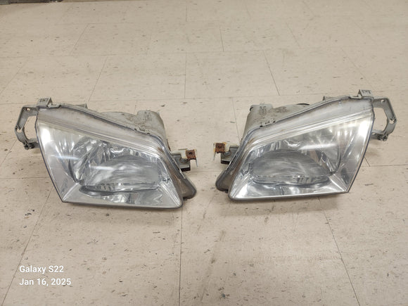 1999-2000 Mazda Protege Headlights Set