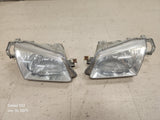 1999-2000 Mazda Protege Headlights Set