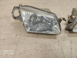1999-2000 Mazda Protege Headlights Set